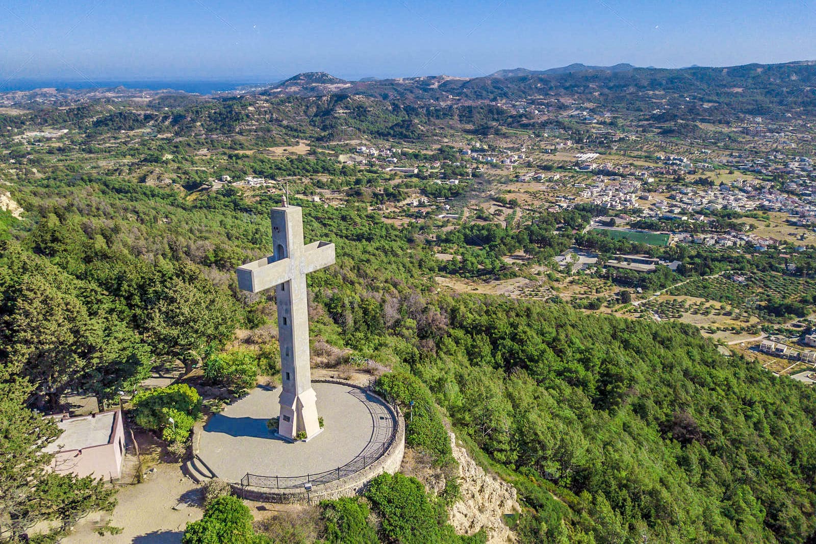 Mount Filerimos cross and peacocks in Rhodes